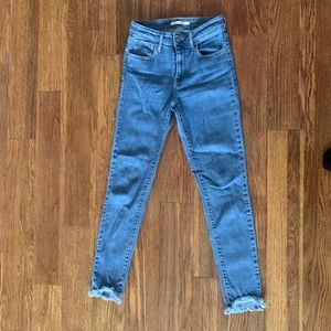 Levi’s 721 High Rise Skinny Frayed Jeans
